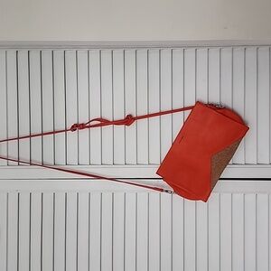 Puxie Mood crossbody purse adjustable straps. Orange & cork